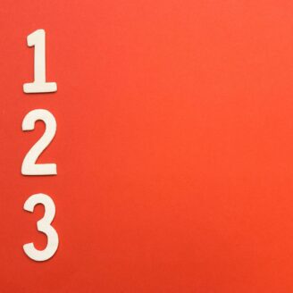 numbers 1,2, and 3 on a red background