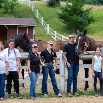 L to R: Alexis Watkins, Alexandra Watkins, Phyllis Smith, Addy Smith, Kevin Alder, Angelina Dahlin and Pauline Strano Dahlin pose for a photo at February Star Sanctuary