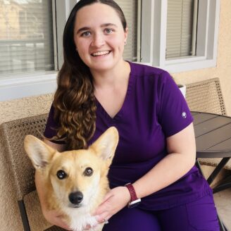 Dr. Melanie Martin with a dog