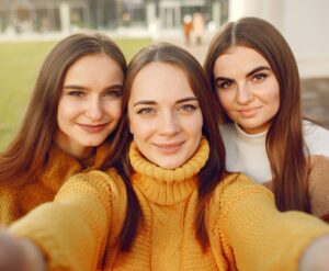 three girls taking a selfie