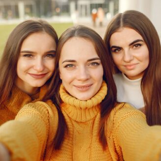 three girls taking a selfie